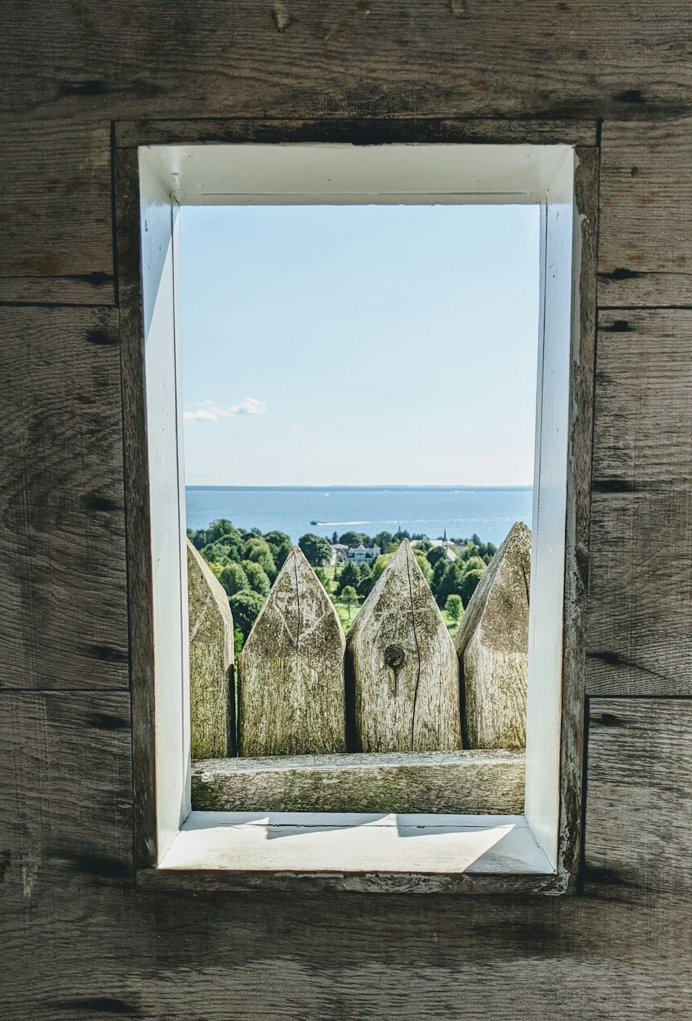 white wooden framed glass window