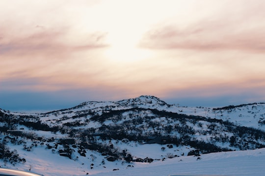 snow covered mountain under cloudy sky during daytime in Perisher Valley NSW Australia