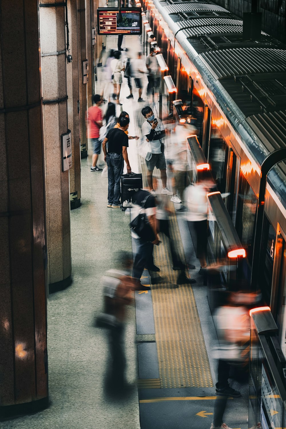 people walking on hallway during daytime