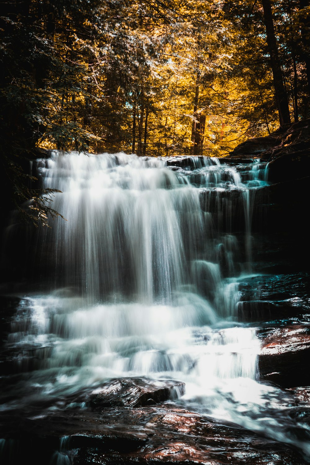 time lapse photography of water falls