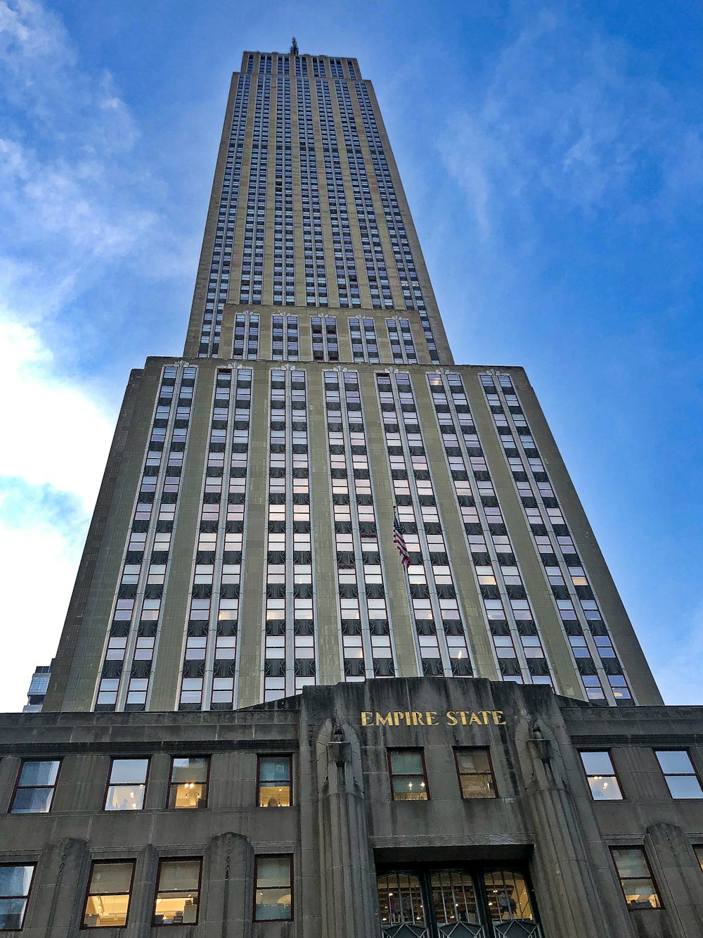 gray concrete building under blue sky during daytime