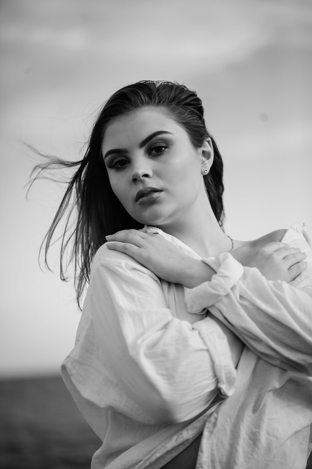 woman in white long sleeve shirt