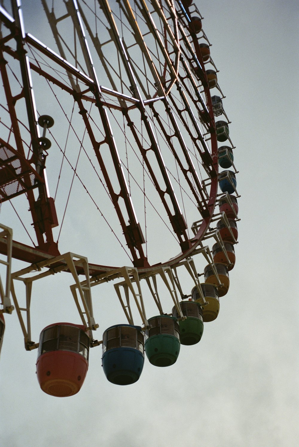 people riding on roller coaster during daytime