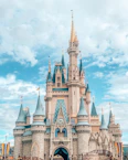 Cinderella Castle with blue turrets and stone walls in Magic Kingdom, Orlando