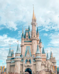 Cinderella Castle with blue turrets and stone walls in Magic Kingdom, Orlando