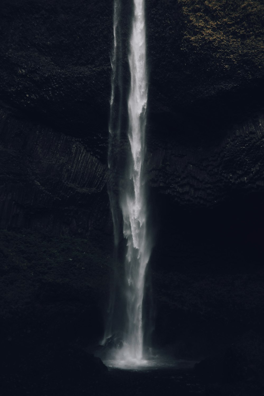 water splash on black and white textile