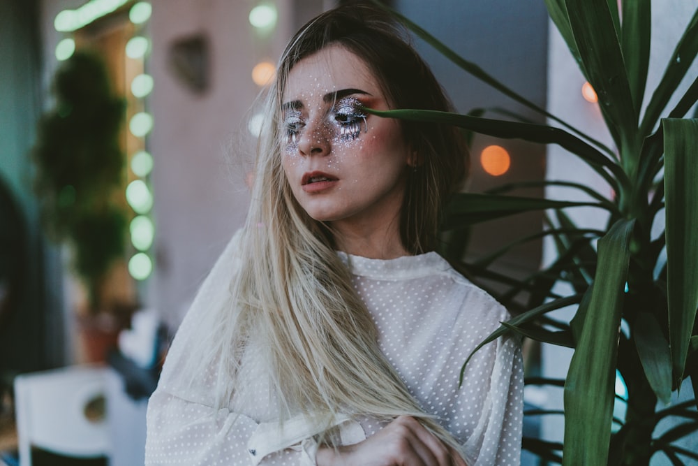 woman in white crew neck shirt wearing sunglasses