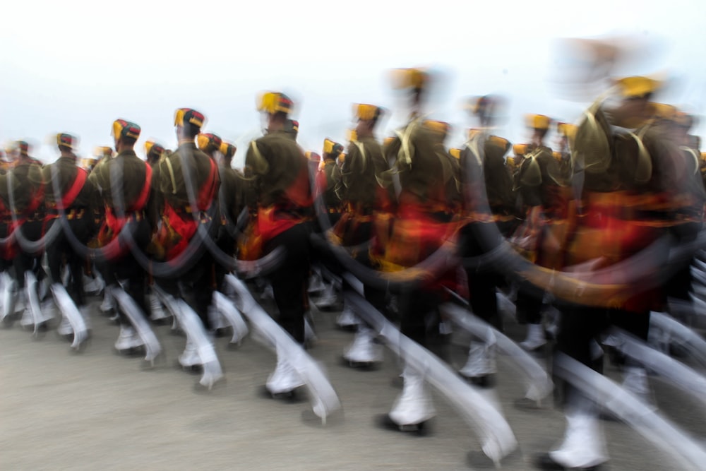 soldiers in green and brown camouflage uniform