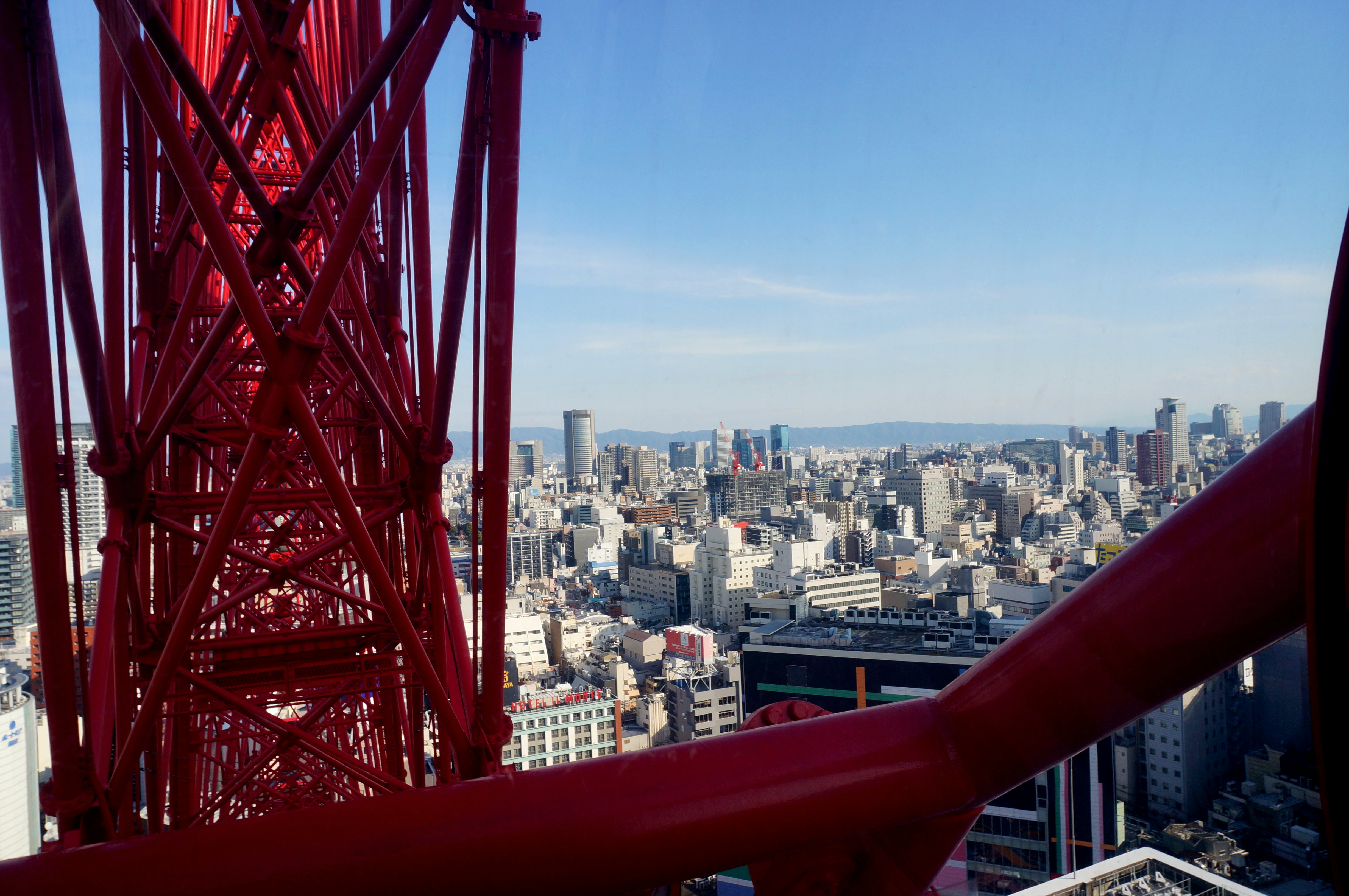 Red metal railings near city buildings during daytime photo – Free ...