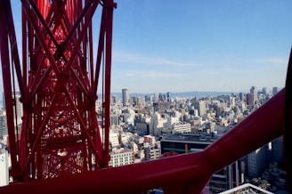 A panoramic view of a completed multi-story building under a clear blue sky.