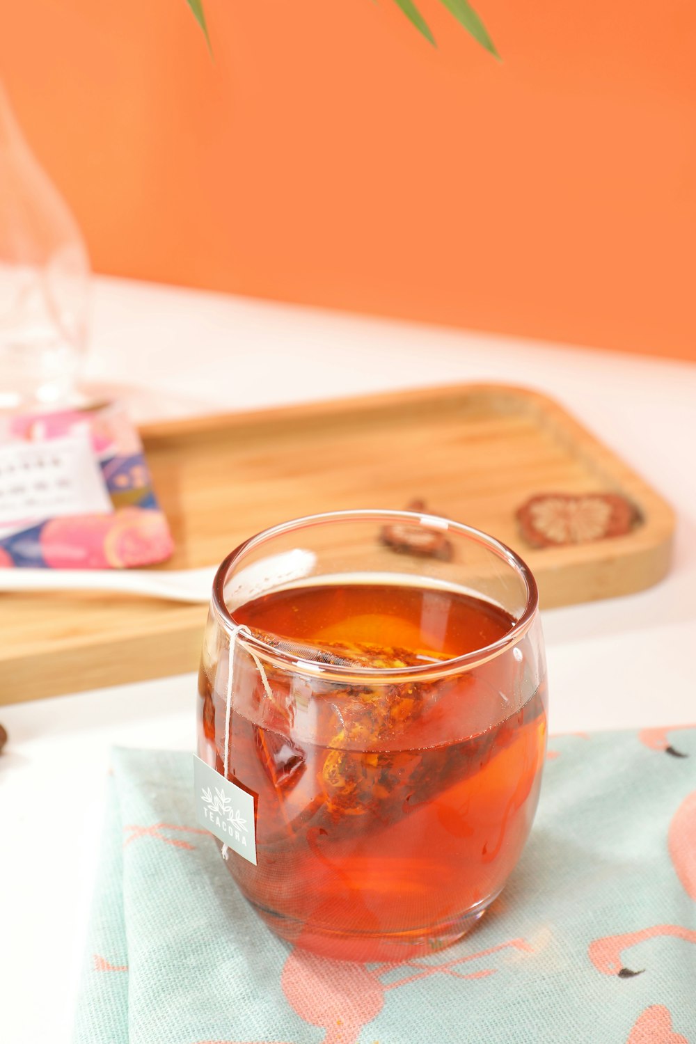 clear drinking glass with red liquid