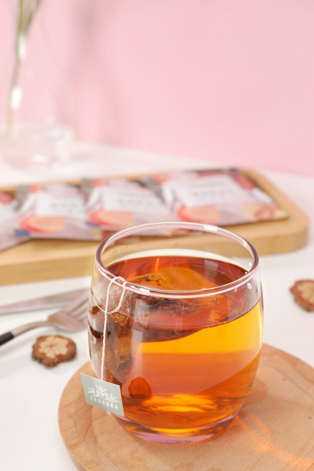 clear drinking glass with orange liquid