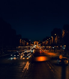 cars on road during night time