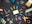 assorted color plastic tools on gray wooden table