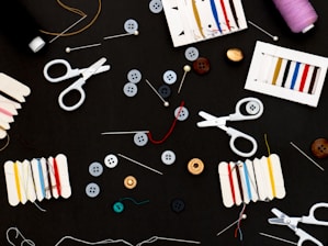 assorted color pencils on black table