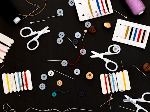 assorted color pencils on black table