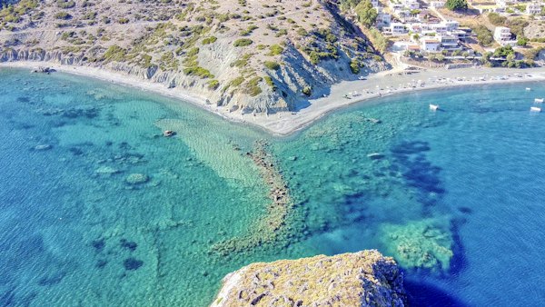 Aerial view of green and brown mountain beside blue sea during daytime — Crete, Greece