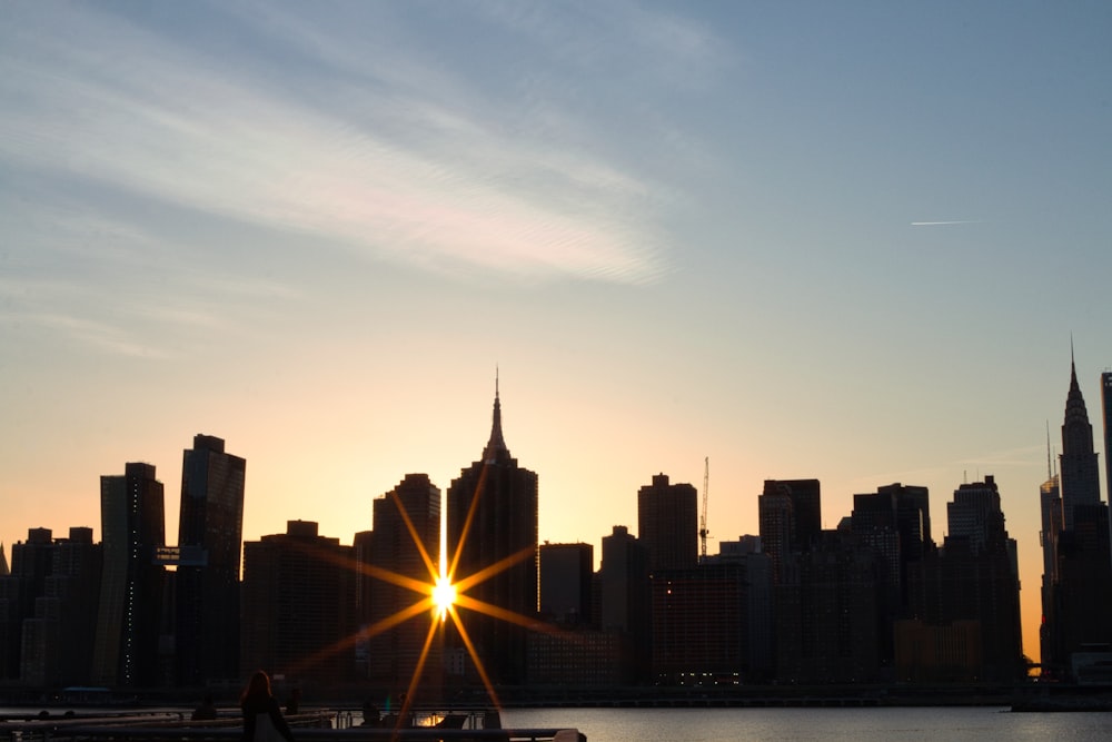 city skyline during sunset with city buildings