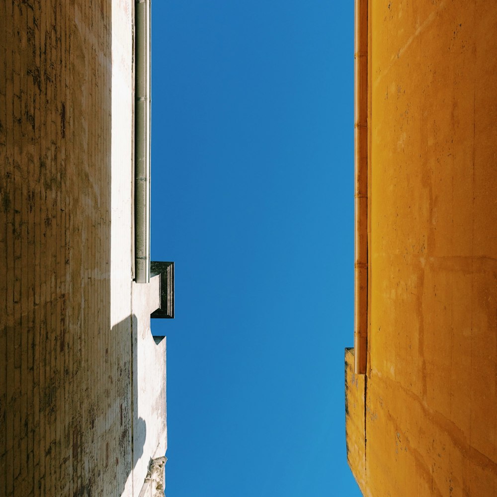 brown concrete building under blue sky during daytime