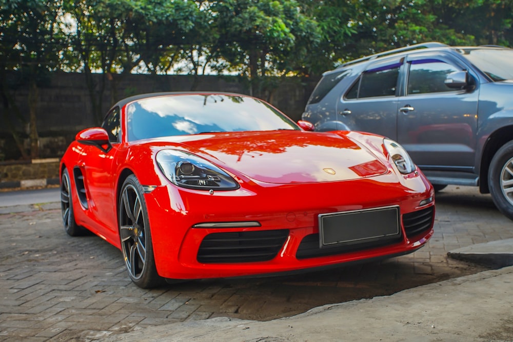 red ferrari 458 italia parked on parking lot