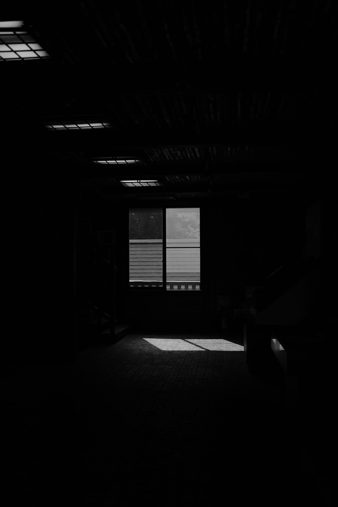 grayscale photo of a room