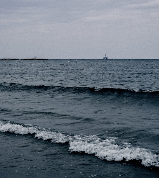 ocean waves crashing on shore during daytime in Eforie Sud Romania