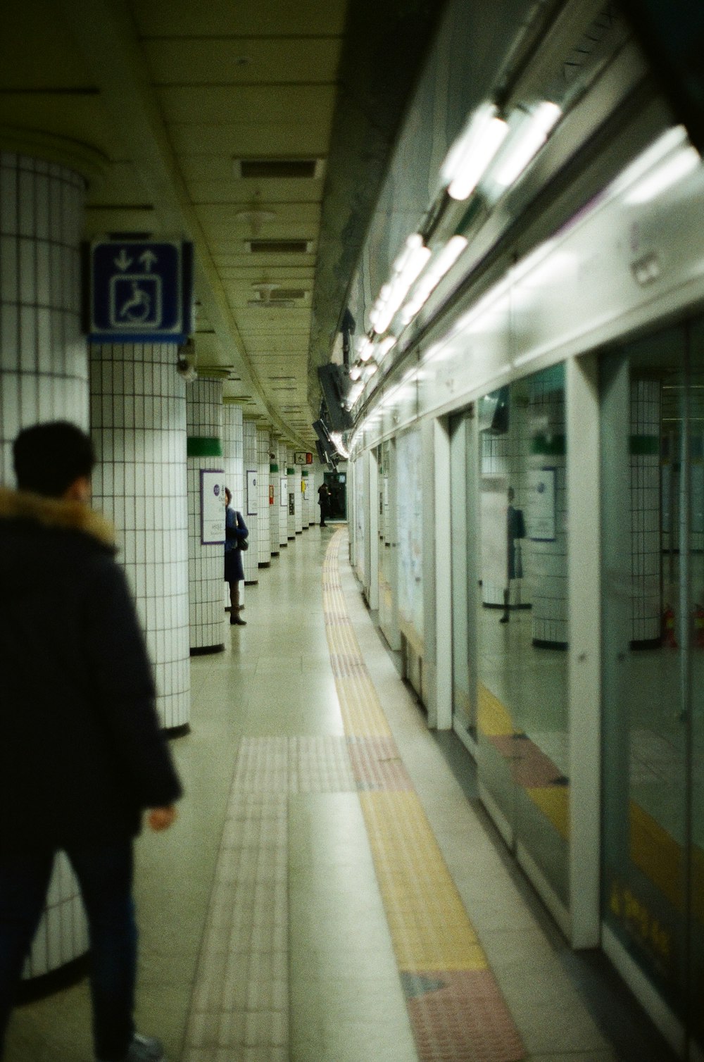 people walking on train station