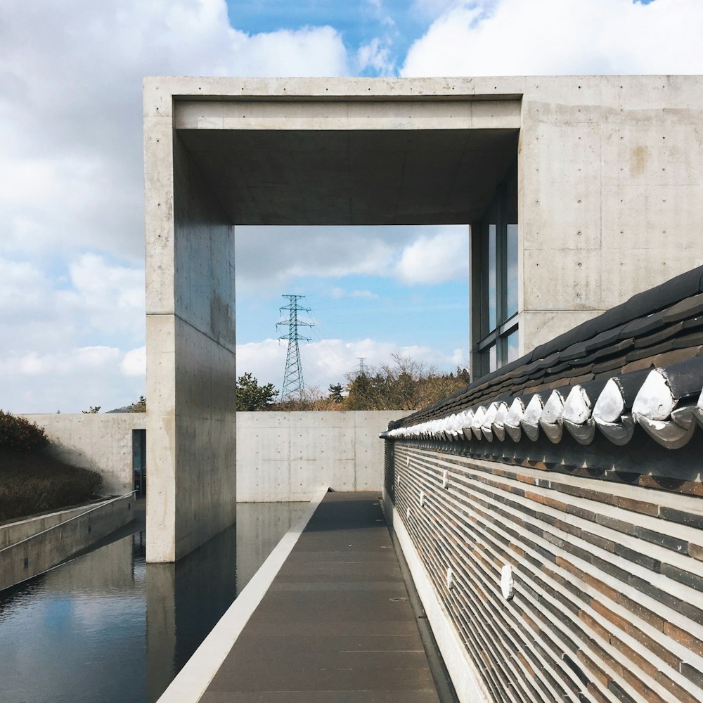 gray concrete bridge over river during daytime