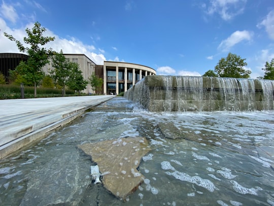 water fountain near white concrete building during daytime in Nashville United States