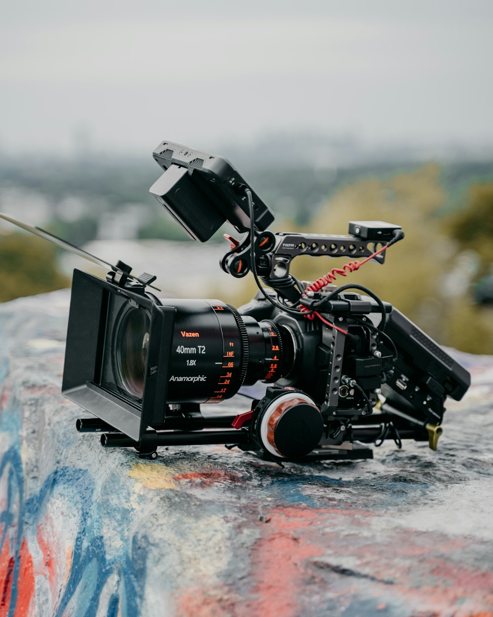 black video camera on white and blue surface