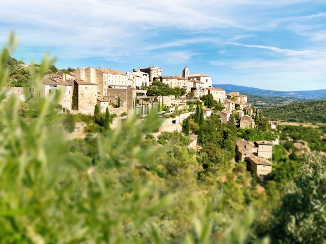 white and brown concrete building under blue sky during daytime