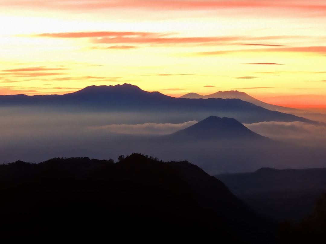 silhouette of mountains during sunset