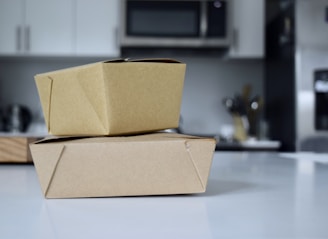 brown cardboard box on white table