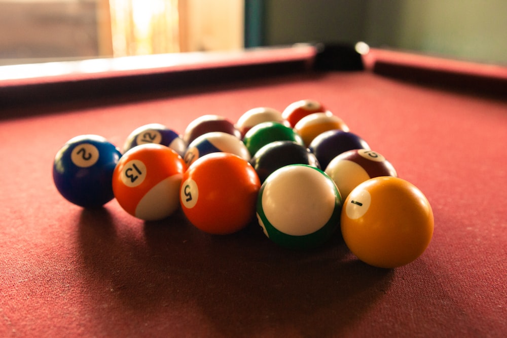 billiard balls on billiard table