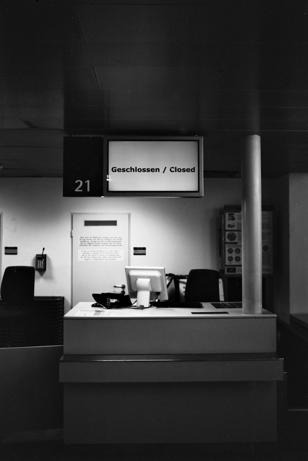 grayscale photo of office room