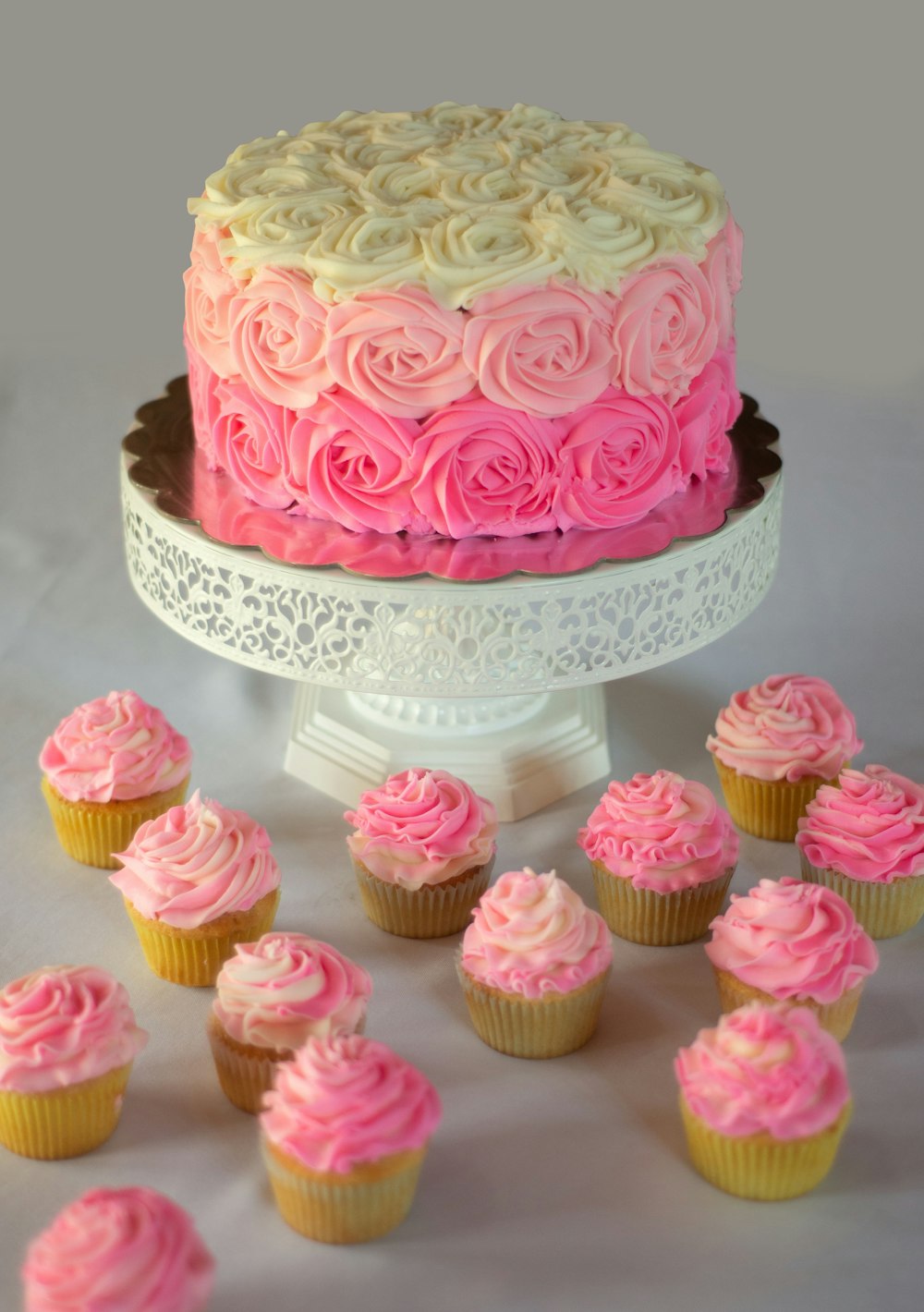 pink and white cake on white table