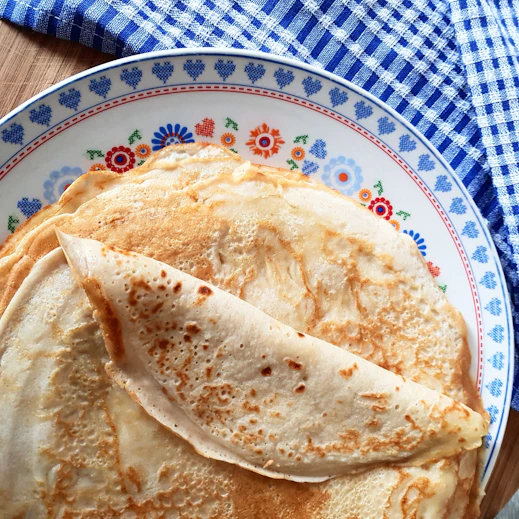white and blue ceramic plate