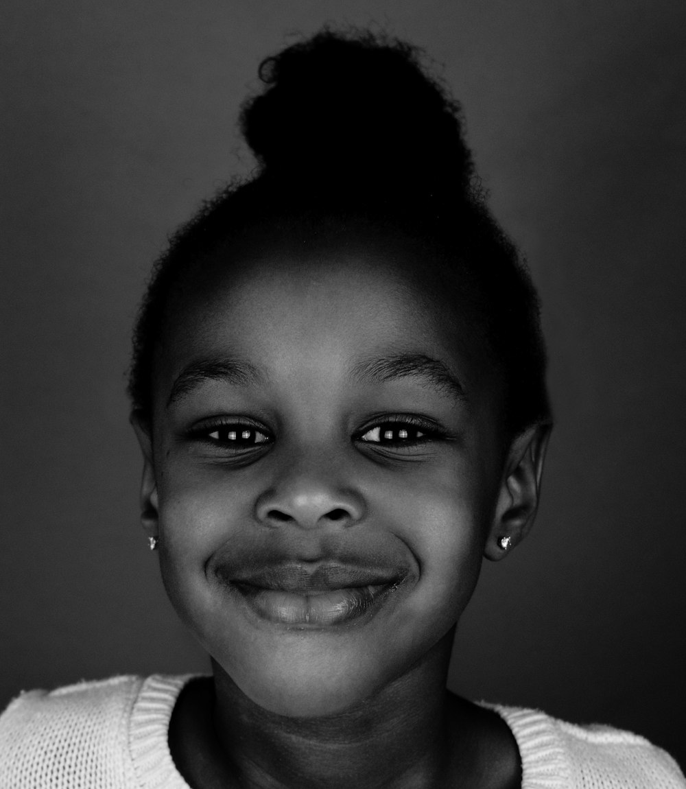 grayscale photo of boy in crew neck shirt