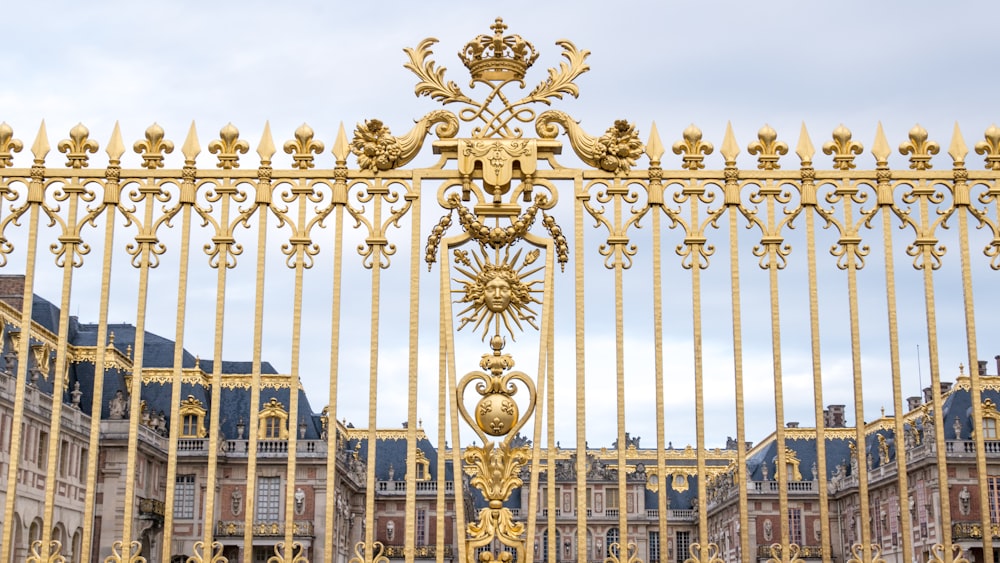 gold and blue metal gate