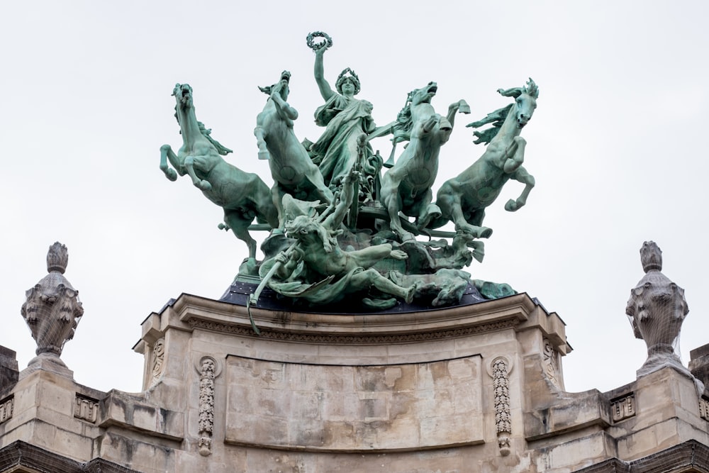 statue of man riding horse