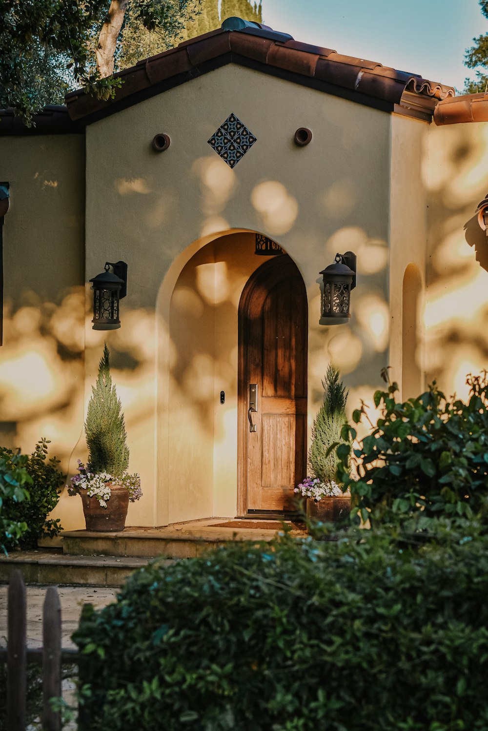 brown wooden door with black steel door lever