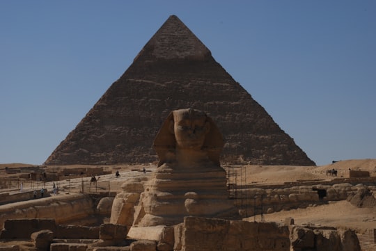 brown concrete pyramid under blue sky during daytime in Pyramid of Khafre Egypt