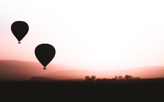 silhouette of hot air balloon during sunset in Kapadokya Turkey