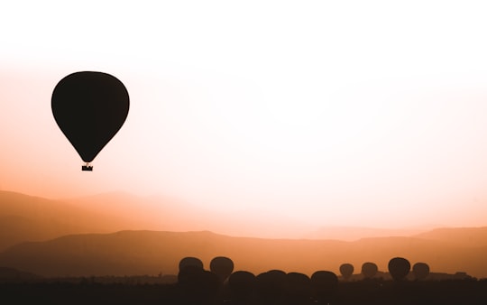 silhouette of people on field during sunset in Kapadokya Turkey