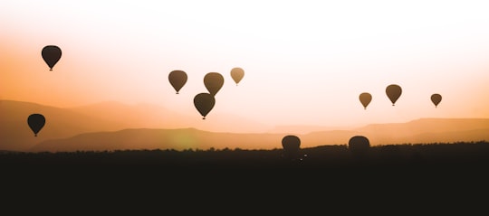 silhouette of hot air balloons during sunset in Kapadokya Turkey