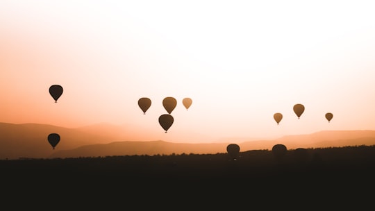 silhouette of hot air balloons during sunset in Kapadokya Turkey