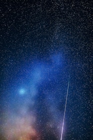 A stunning starry night sky filled with intense colors and lights.