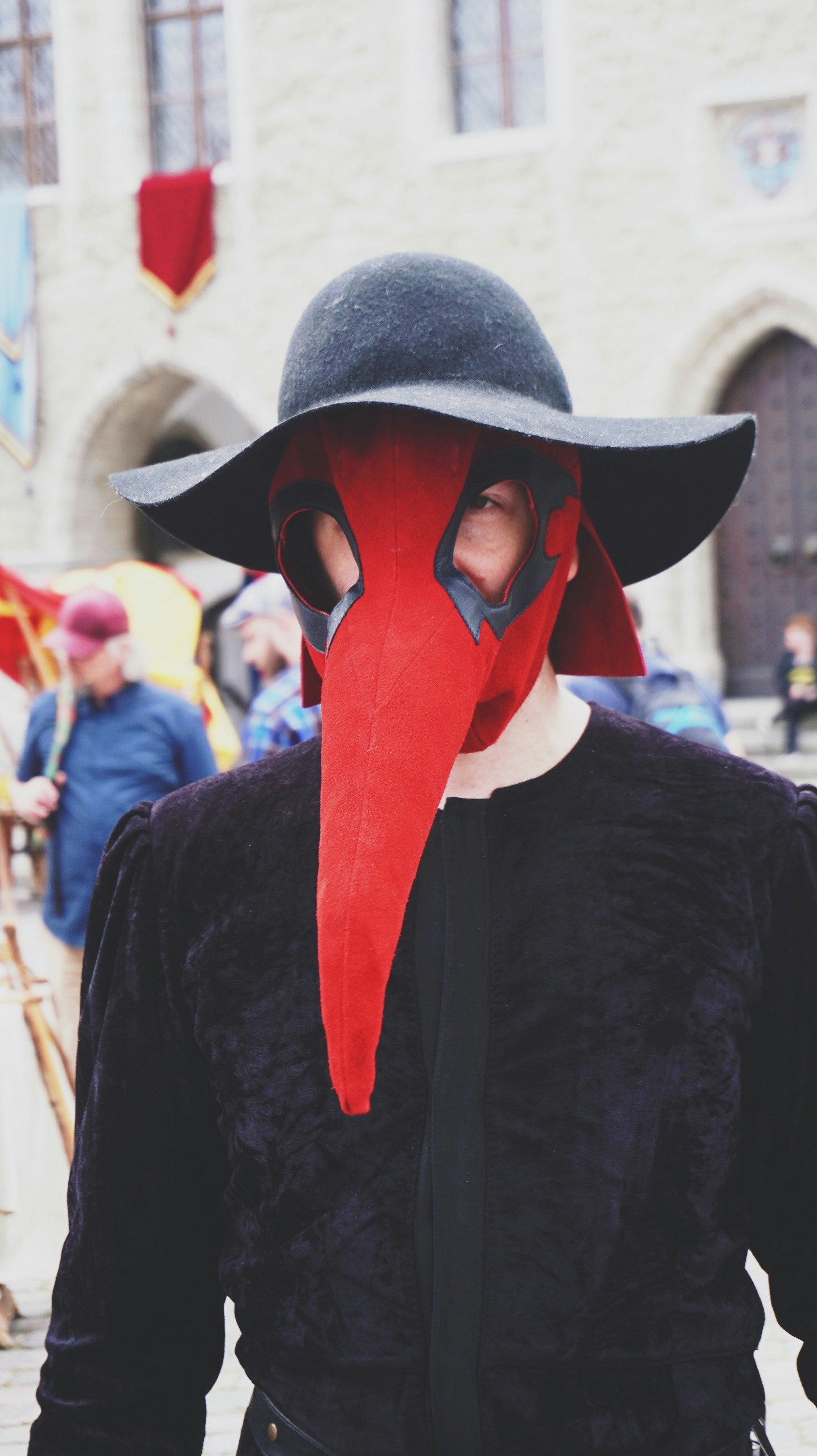 man in black hat and black jacket