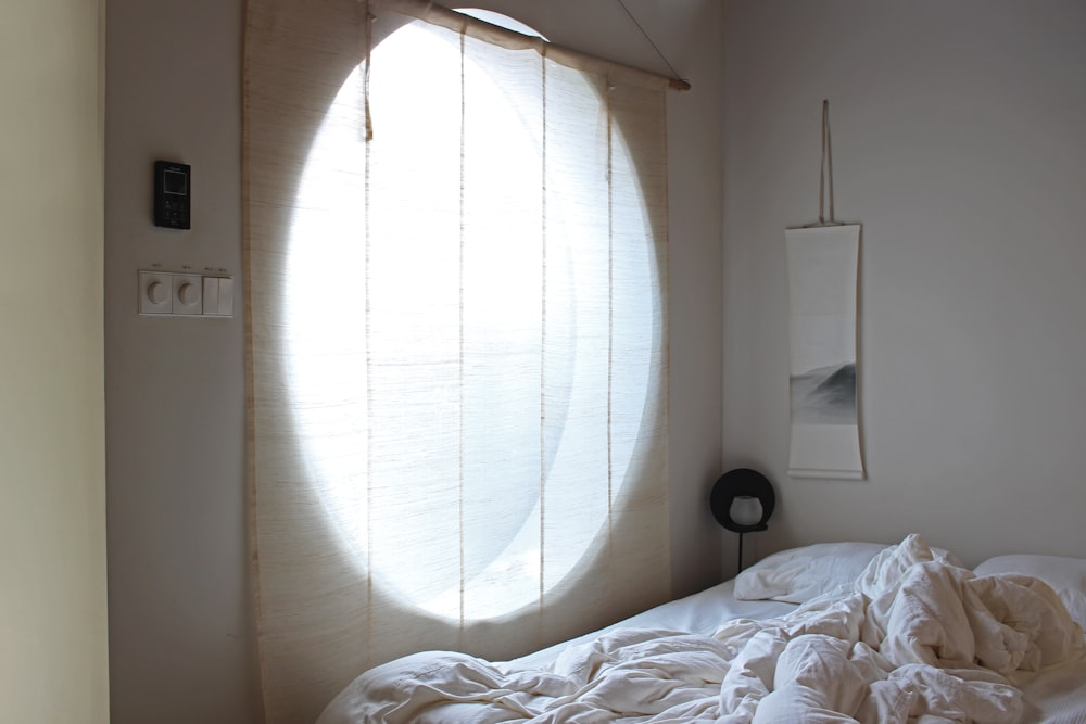 white and gray striped bed linen