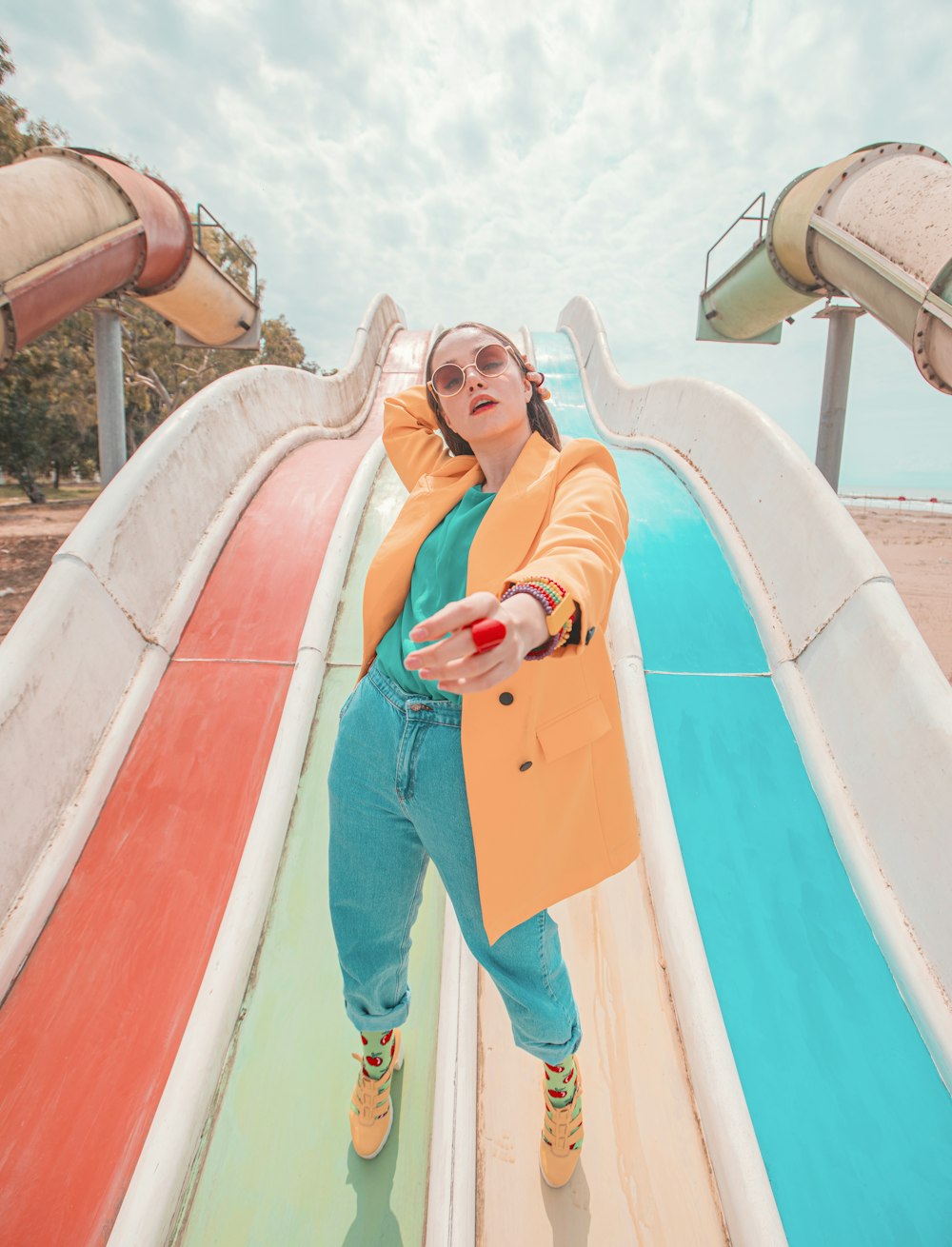 woman in blue and white suit standing on boat during daytime